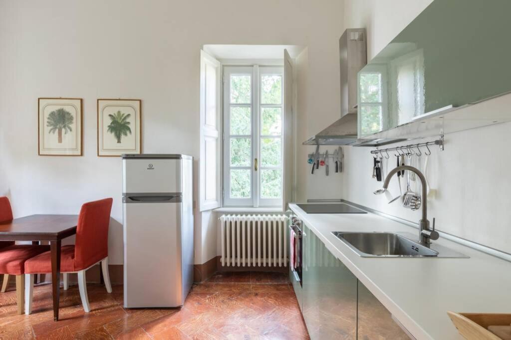 Bilocale Nel Parco Di Villa Erba Cernobbio Bagian luar foto