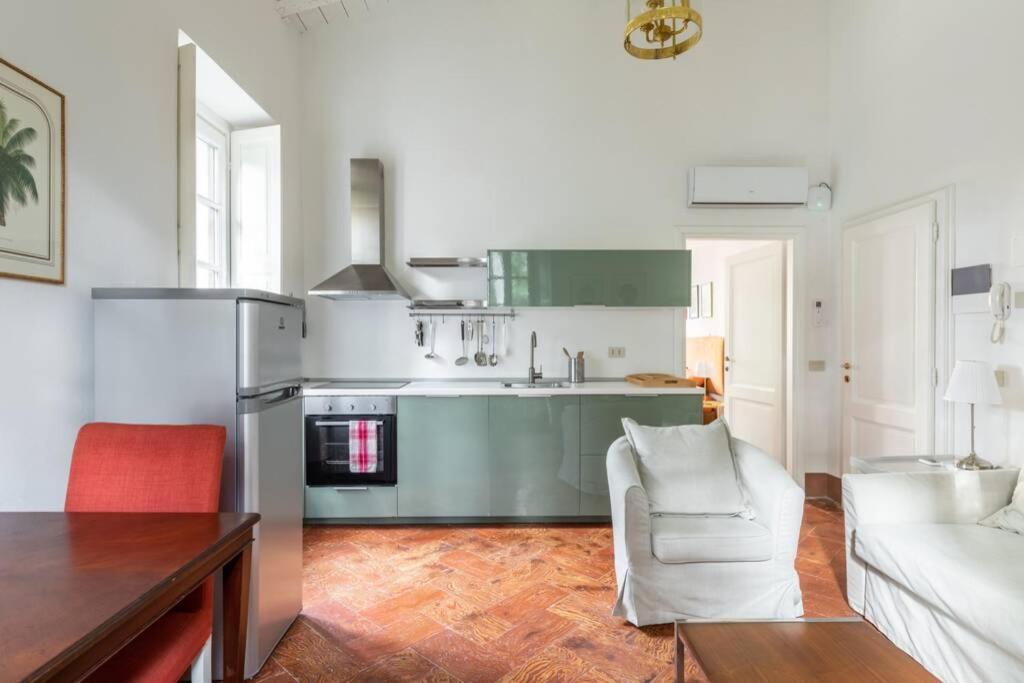 Bilocale Nel Parco Di Villa Erba Cernobbio Bagian luar foto